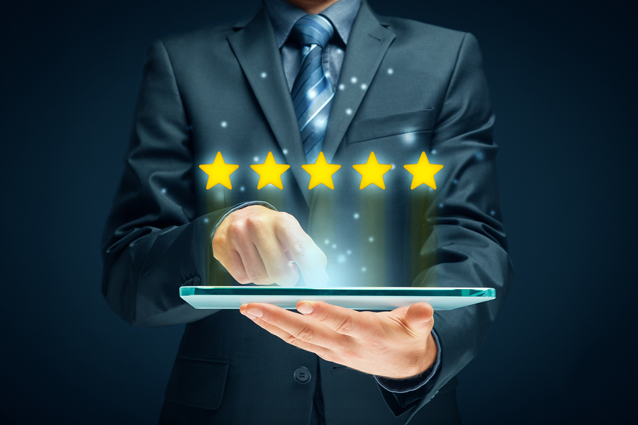 a mans holding mobile-tablet